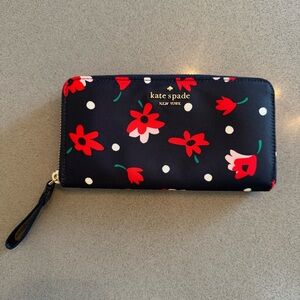kate spade navy floral zip-around wallet.
